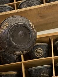 20 Chinese coconut 'Shou' cups in wooden presentation boxes, 19/20th C.