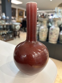 Two Chinese monochrome copper-red and peachbloom-glazed vases, 18/19th C.