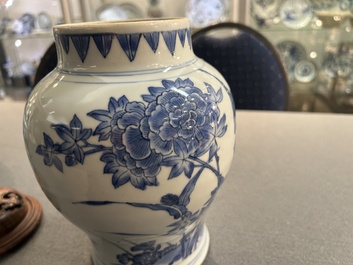 A Chinese blue and white vase with birds among blossoming branches, Transitional period