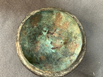 A Chinese ritual bronze 'hu' wine vessel and cover, Eastern Zhou or earlier
