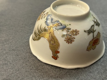 A Chinese grisaille and gilt 'roosters' cup and two saucers, Yongzheng