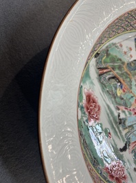 A rare large deep Chinese famille rose dish with fine figurative design, Yongzheng