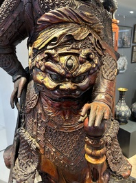 A very large Chinese gilt-lacquered wood figure of Weituo, 17th C.