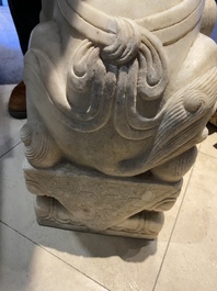 A pair of large Chinese white marble Buddhist lions, 19th C.