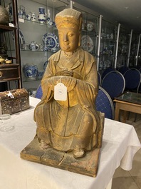 A large Chinese gilded stucco and wood sculpture of the Taoist Jade Emperor, 17th C.