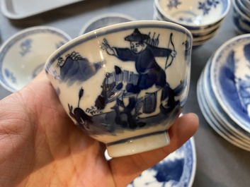 13 Chinese blue and white 'rabbit hunt' cups and 10 saucers, Qianlong mark, 19th C.