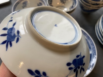 13 Chinese blue and white 'rabbit hunt' cups and 10 saucers, Qianlong mark, 19th C.