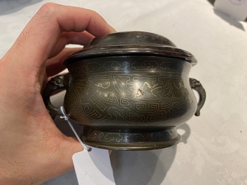A Chinese silver-inlaid bronze censer with wooden cover, Shi Shou 石叟 mark, 19th C.