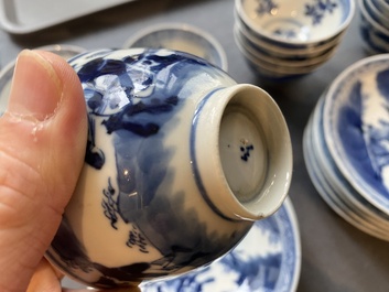 13 Chinese blue and white 'rabbit hunt' cups and 10 saucers, Qianlong mark, 19th C.