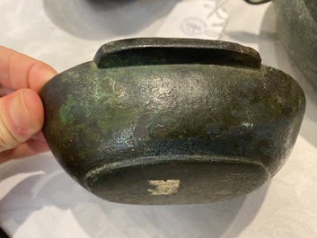 Three Chinese elliptical bronze cups, Eastern Zhou and Han