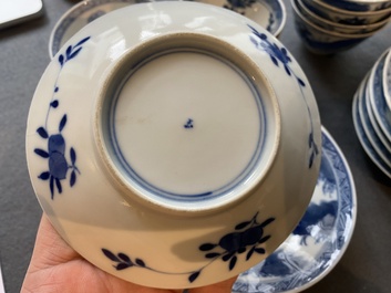 13 Chinese blue and white 'rabbit hunt' cups and 10 saucers, Qianlong mark, 19th C.