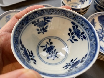 13 Chinese blue and white 'rabbit hunt' cups and 10 saucers, Qianlong mark, 19th C.