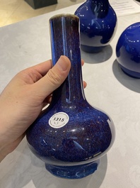 Three Chinese monochrome blue- and flamb&eacute;-glazed bottle vases, 19/20th C