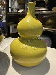 A Chinese monochrome yellow double gourd vase and a blue vase and cover, Republic