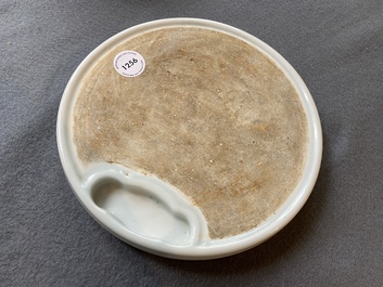 A Chinese white-glazed anhua-decorated ink stone, Qing