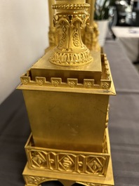 An impressive three-piece gilt bronze chinoiserie clock garniture, France, 19th C.