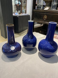 Three Chinese monochrome blue- and flamb&eacute;-glazed bottle vases, 19/20th C