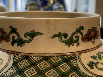 A pair of Chinese verte biscuit vases and covers, 19th C.