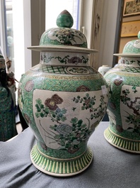 A pair of Chinese verte biscuit vases and covers, 19th C.