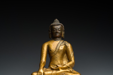 A Sino-Tibetan gilt bronze Buddha, 18th C.