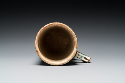 A polychrome Iznik-style mug, Kutahya, Turkey, 19th C.