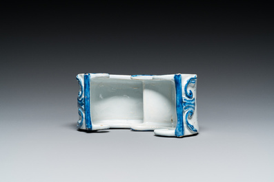 A Dutch Delft blue and white pipe stand in the shape of a sleigh, 18th C.