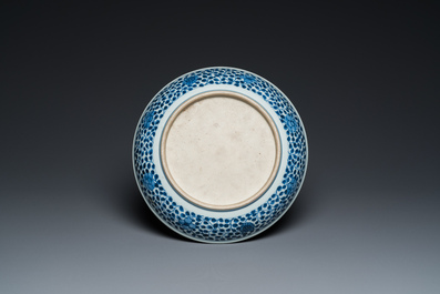 A Chinese blue and white Ming-style 'flower bouquet' dish, Qianlong