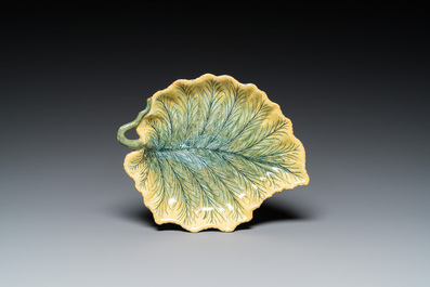 A polychrome Dutch Delft melon-shaped tureen on leaf-shaped stand, 18th C.