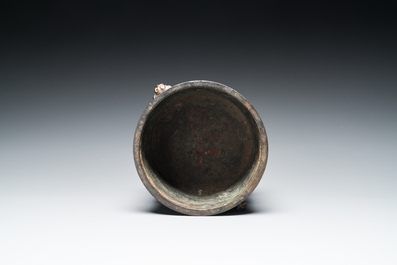 A Chinese bronze censer with mythical beast head handles, Xuande mark, Kangxi
