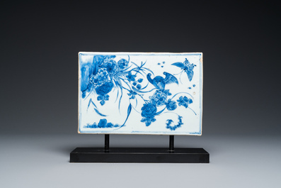 A Chinese rectangular blue and white 'beheading' tile, Kangxi