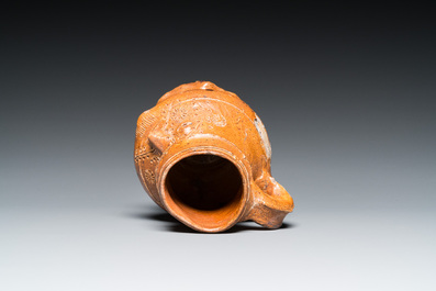 A stoneware 'pointy nose face' jug, probably Raeren, 15/16th C.