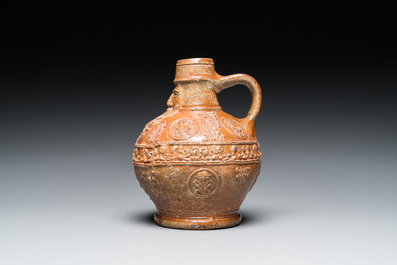 A small stoneware bellarmine jug with portrait medallions, Cologne, 16th C.