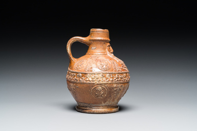 A small stoneware bellarmine jug with portrait medallions, Cologne, 16th C.
