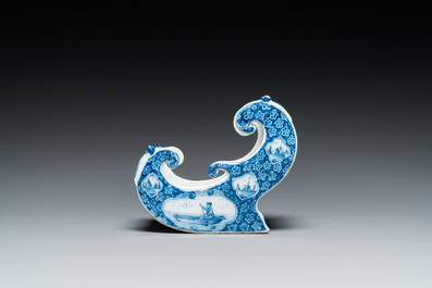 A Dutch Delft blue and white pipe stand in the shape of a sleigh, 18th C.