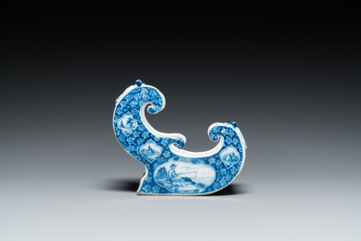 A Dutch Delft blue and white pipe stand in the shape of a sleigh, 18th C.