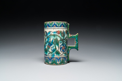A polychrome Iznik-style mug, Kutahya, Turkey, 19th C.