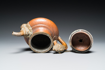 Five Tibetan ritual objects in copper, silver, jade and wood, 19/20th C.