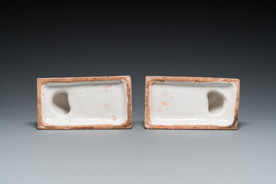 A pair of polychrome Brussels faience greyhounds, 18th C.
