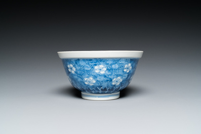 A Chinese blue and white 'prunus on cracked ice' bowl, Chenghua mark, Kangxi