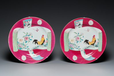 A pair of large Chinese famille rose ruby-ground 'rooster' dishes, Yongzheng