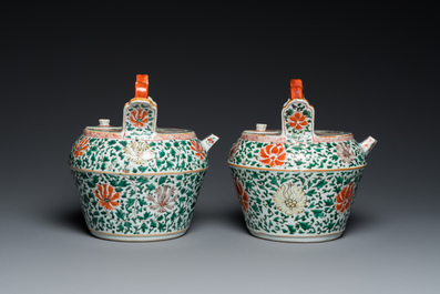 A pair of Chinese famille verte lime pots and covers, Kangxi