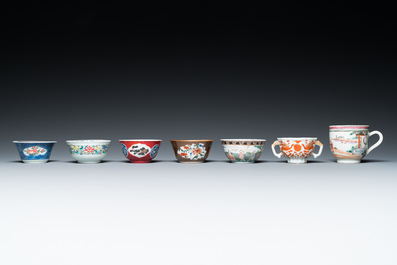 Seven Chinese famille rose cups and seven saucers, Yongzheng/Qianlong