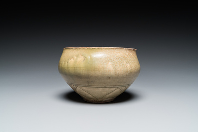 A Chinese Yaozhou celadon 'lotus' bowl, Song/Yuan