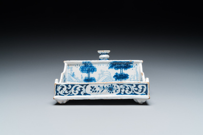 A Delft-style blue and white faience inkwell, probably Germany, signed and dated 1715