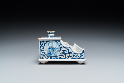 A Delft-style blue and white faience inkwell, probably Germany, signed and dated 1715