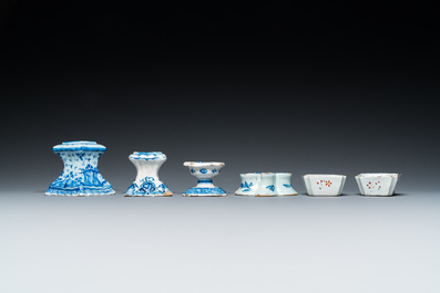 Four blue and white Dutch Delft salts and two small numerically inscribed bowls, 18th C.