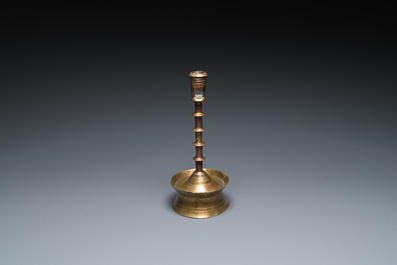 A Dutch or Flemish knotted bronze candlestick, 15/16th C.