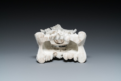 A blanc de Chine porcelain rococo case clock, probably Meissen, 18th C.