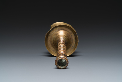 A Dutch or Flemish knotted bronze candlestick, 15/16th C.