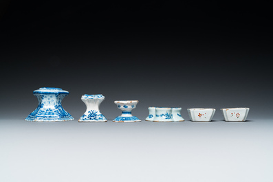 Four blue and white Dutch Delft salts and two small numerically inscribed bowls, 18th C.